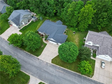 Beautifully maintained home sits on a spacious .69-acre lot on Menomonie Country Club in Wisconsin - for sale on GolfHomes.com, golf home, golf lot