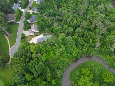 Beautifully maintained home sits on a spacious .69-acre lot on Menomonie Country Club in Wisconsin - for sale on GolfHomes.com, golf home, golf lot