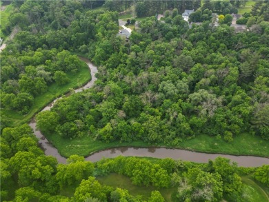 Beautifully maintained home sits on a spacious .69-acre lot on Menomonie Country Club in Wisconsin - for sale on GolfHomes.com, golf home, golf lot