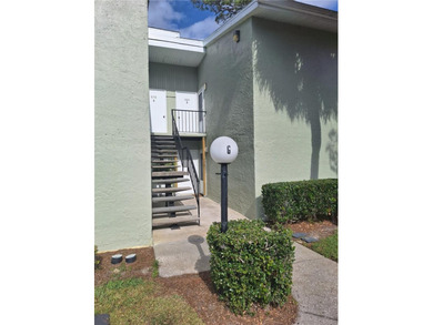 Come see this GROUND FLOOR condominium with Golf Course AND Lake on Country Club At Silver Springs Shores in Florida - for sale on GolfHomes.com, golf home, golf lot