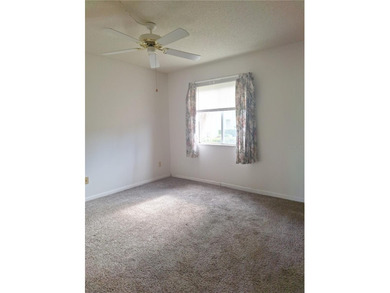 Come see this GROUND FLOOR condominium with Golf Course AND Lake on Country Club At Silver Springs Shores in Florida - for sale on GolfHomes.com, golf home, golf lot