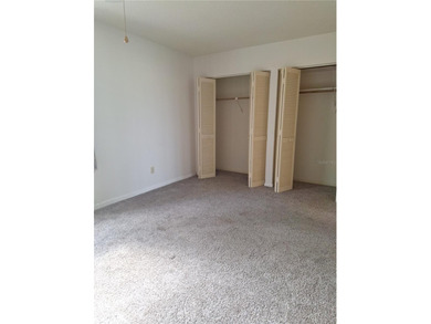 Come see this GROUND FLOOR condominium with Golf Course AND Lake on Country Club At Silver Springs Shores in Florida - for sale on GolfHomes.com, golf home, golf lot