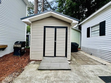 ADORABLE 2 BED/1.5 BATH BEACH HOUSE WITH WRAPAROUND COMPOSITE on Prestwick Country Club in South Carolina - for sale on GolfHomes.com, golf home, golf lot
