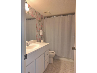 Come see this GROUND FLOOR condominium with Golf Course AND Lake on Country Club At Silver Springs Shores in Florida - for sale on GolfHomes.com, golf home, golf lot