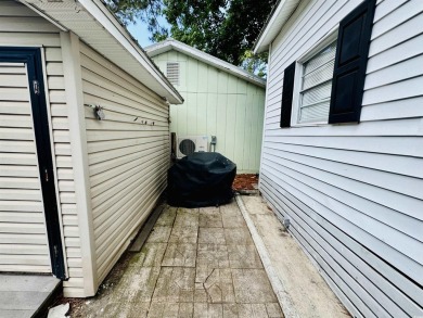 ADORABLE 2 BED/1.5 BATH BEACH HOUSE WITH WRAPAROUND COMPOSITE on Prestwick Country Club in South Carolina - for sale on GolfHomes.com, golf home, golf lot