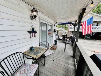 ADORABLE 2 BED/1.5 BATH BEACH HOUSE WITH WRAPAROUND COMPOSITE on Prestwick Country Club in South Carolina - for sale on GolfHomes.com, golf home, golf lot