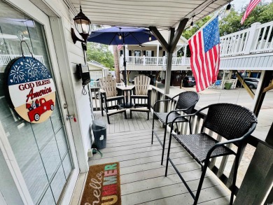 ADORABLE 2 BED/1.5 BATH BEACH HOUSE WITH WRAPAROUND COMPOSITE on Prestwick Country Club in South Carolina - for sale on GolfHomes.com, golf home, golf lot