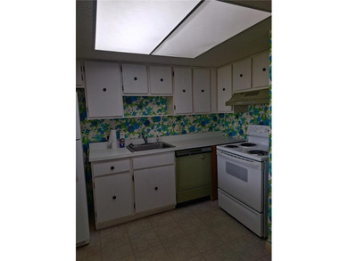 Come see this GROUND FLOOR condominium with Golf Course AND Lake on Country Club At Silver Springs Shores in Florida - for sale on GolfHomes.com, golf home, golf lot