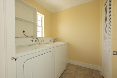 Under contract-accepting backup offers. Fore! This mid-century on Babe Zaharias Golf Course in Florida - for sale on GolfHomes.com, golf home, golf lot