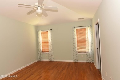 A Beautiful three bedroom, two bath home  with fenced back yard on Masonboro Country Club in North Carolina - for sale on GolfHomes.com, golf home, golf lot