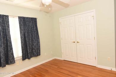 A Beautiful three bedroom, two bath home with fenced back yard on Masonboro Country Club in North Carolina - for sale on GolfHomes.com, golf home, golf lot