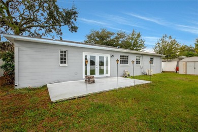 Under contract-accepting backup offers. Fore! This mid-century on Babe Zaharias Golf Course in Florida - for sale on GolfHomes.com, golf home, golf lot