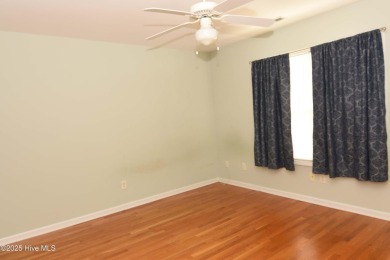 A Beautiful three bedroom, two bath home  with fenced back yard on Masonboro Country Club in North Carolina - for sale on GolfHomes.com, golf home, golf lot