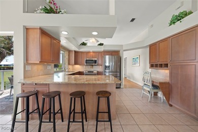 This impeccably maintained traditional style home sits on a on Beachview Golf Club in Florida - for sale on GolfHomes.com, golf home, golf lot