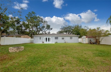 Under contract-accepting backup offers. Fore! This mid-century on Babe Zaharias Golf Course in Florida - for sale on GolfHomes.com, golf home, golf lot