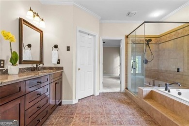 **Downsize without compromise and enjoy easy, lock-and-leave on The Golf Club of Georgia in Georgia - for sale on GolfHomes.com, golf home, golf lot