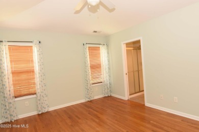 A Beautiful three bedroom, two bath home  with fenced back yard on Masonboro Country Club in North Carolina - for sale on GolfHomes.com, golf home, golf lot
