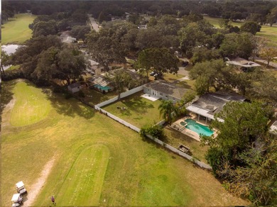 Under contract-accepting backup offers. Fore! This mid-century on Babe Zaharias Golf Course in Florida - for sale on GolfHomes.com, golf home, golf lot