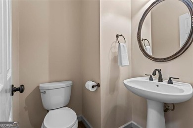 **Downsize without compromise and enjoy easy, lock-and-leave on The Golf Club of Georgia in Georgia - for sale on GolfHomes.com, golf home, golf lot