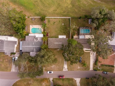 Under contract-accepting backup offers. Fore! This mid-century on Babe Zaharias Golf Course in Florida - for sale on GolfHomes.com, golf home, golf lot