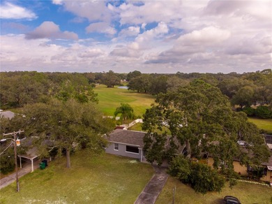 Under contract-accepting backup offers. Fore! This mid-century on Babe Zaharias Golf Course in Florida - for sale on GolfHomes.com, golf home, golf lot
