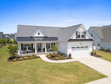 Experience exceptional coastal living at 429 Jackline Drive, a on Olde Point Golf and Country Club in North Carolina - for sale on GolfHomes.com, golf home, golf lot