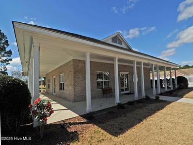 A Beautiful three bedroom, two bath home with fenced back yard on Masonboro Country Club in North Carolina - for sale on GolfHomes.com, golf home, golf lot