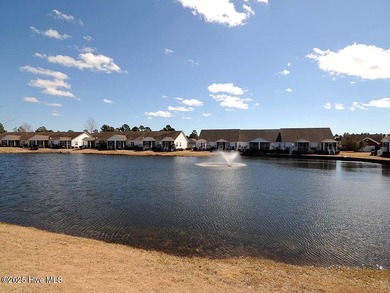 A Beautiful three bedroom, two bath home with fenced back yard on Masonboro Country Club in North Carolina - for sale on GolfHomes.com, golf home, golf lot