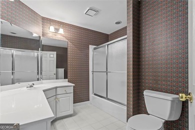 **Downsize without compromise and enjoy easy, lock-and-leave on The Golf Club of Georgia in Georgia - for sale on GolfHomes.com, golf home, golf lot