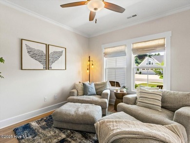 Experience exceptional coastal living at 429 Jackline Drive, a on Olde Point Golf and Country Club in North Carolina - for sale on GolfHomes.com, golf home, golf lot