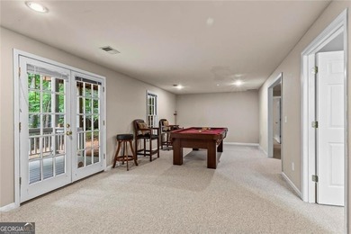 **Downsize without compromise and enjoy easy, lock-and-leave on The Golf Club of Georgia in Georgia - for sale on GolfHomes.com, golf home, golf lot