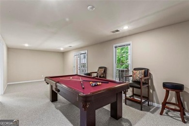 **Downsize without compromise and enjoy easy, lock-and-leave on The Golf Club of Georgia in Georgia - for sale on GolfHomes.com, golf home, golf lot