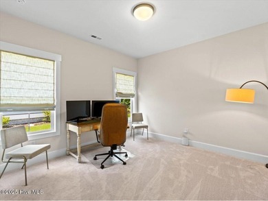 Experience exceptional coastal living at 429 Jackline Drive, a on Olde Point Golf and Country Club in North Carolina - for sale on GolfHomes.com, golf home, golf lot