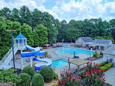**Downsize without compromise and enjoy easy, lock-and-leave on The Golf Club of Georgia in Georgia - for sale on GolfHomes.com, golf home, golf lot
