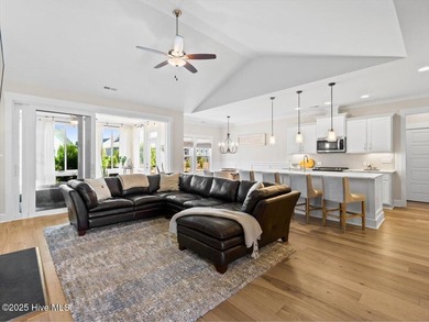 Experience exceptional coastal living at 429 Jackline Drive, a on Olde Point Golf and Country Club in North Carolina - for sale on GolfHomes.com, golf home, golf lot