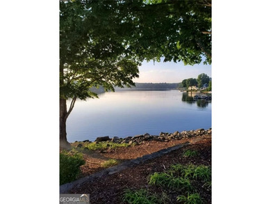 **Downsize without compromise and enjoy easy, lock-and-leave on The Golf Club of Georgia in Georgia - for sale on GolfHomes.com, golf home, golf lot