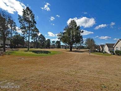 A Beautiful three bedroom, two bath home with fenced back yard on Masonboro Country Club in North Carolina - for sale on GolfHomes.com, golf home, golf lot