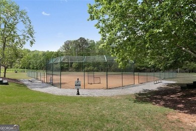 **Downsize without compromise and enjoy easy, lock-and-leave on The Golf Club of Georgia in Georgia - for sale on GolfHomes.com, golf home, golf lot
