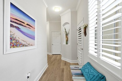 Expansive golf course views from this updated end-unit in on Grand Haven Golf Club in Florida - for sale on GolfHomes.com, golf home, golf lot