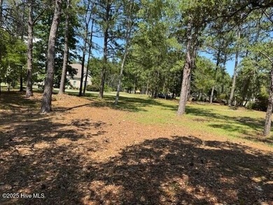 Build your dream home on this lightly wooded, ready-to-build lot on Ocean Ridge Plantation in North Carolina - for sale on GolfHomes.com, golf home, golf lot