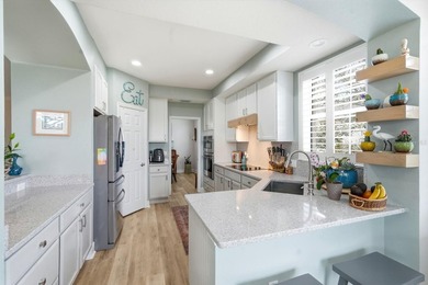 Expansive golf course views from this updated end-unit in on Grand Haven Golf Club in Florida - for sale on GolfHomes.com, golf home, golf lot