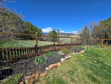 Experience the most spectacular mountain views in the area from on Hollydot Golf Course in Colorado - for sale on GolfHomes.com, golf home, golf lot