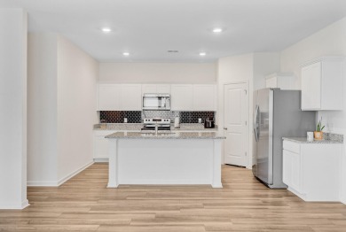 Welcome to this beautifully designed 5-bedroom, 3-bath home on Cypress Point Par 3 in South Carolina - for sale on GolfHomes.com, golf home, golf lot