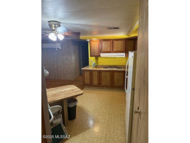Solid financeable home located in desirable part of the on Tucson Estates Golf Course in Arizona - for sale on GolfHomes.com, golf home, golf lot