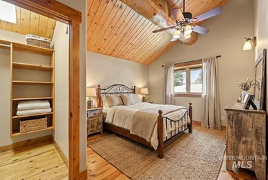 Experience the perfect fusion of classic log craftsmanship and on McCall Municipal Golf Course in Idaho - for sale on GolfHomes.com, golf home, golf lot