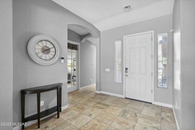 This single-story home in the gated Omni Tucson National resort on Omni Tucson National Golf Resort and Spa - Sonoran in Arizona - for sale on GolfHomes.com, golf home, golf lot