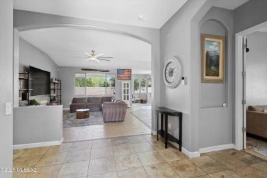 This single-story home in the gated Omni Tucson National resort on Omni Tucson National Golf Resort and Spa - Sonoran in Arizona - for sale on GolfHomes.com, golf home, golf lot