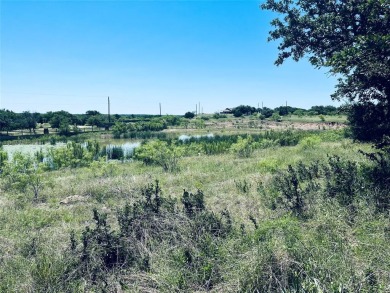 Nestled in the serene surroundings of the Hideout Golf Course on Hideout Golf Club and Resort  in Texas - for sale on GolfHomes.com, golf home, golf lot