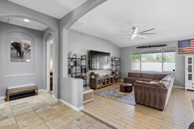This single-story home in the gated Omni Tucson National resort on Omni Tucson National Golf Resort and Spa - Sonoran in Arizona - for sale on GolfHomes.com, golf home, golf lot