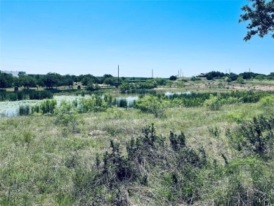 Nestled in the serene surroundings of the Hideout Golf Course on Hideout Golf Club and Resort  in Texas - for sale on GolfHomes.com, golf home, golf lot